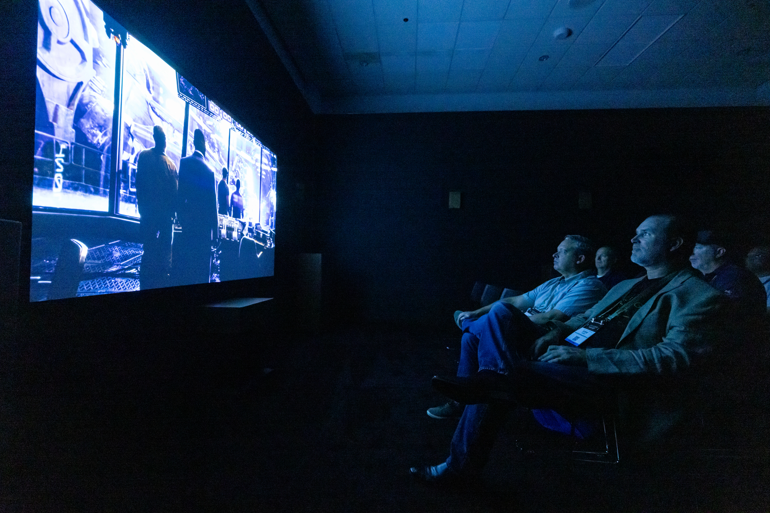 Attendees experiencing a live audio and home theater demo at CEDIA Expo/CIX