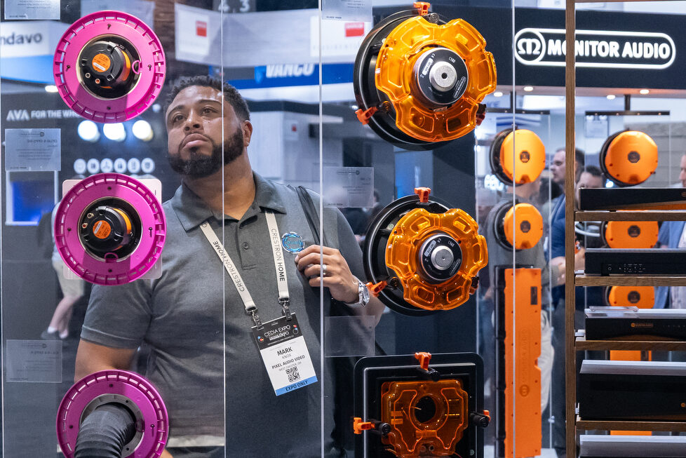 CEDIA Expo/CIX attendee viewing the latest audio products from Monitor Audio.